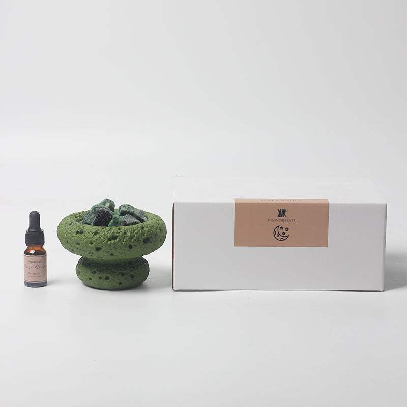 Green Moon Diffuser - Forest Woods with fragrance oils and packaging.