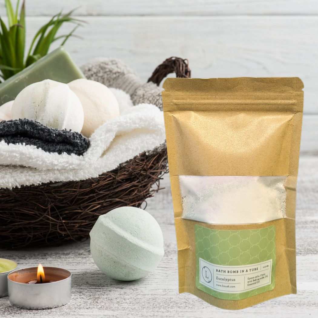 Relaxation Gift Set with blanket, scented candle, shower mist, fluffy socks, bath fizz, and greeting card.