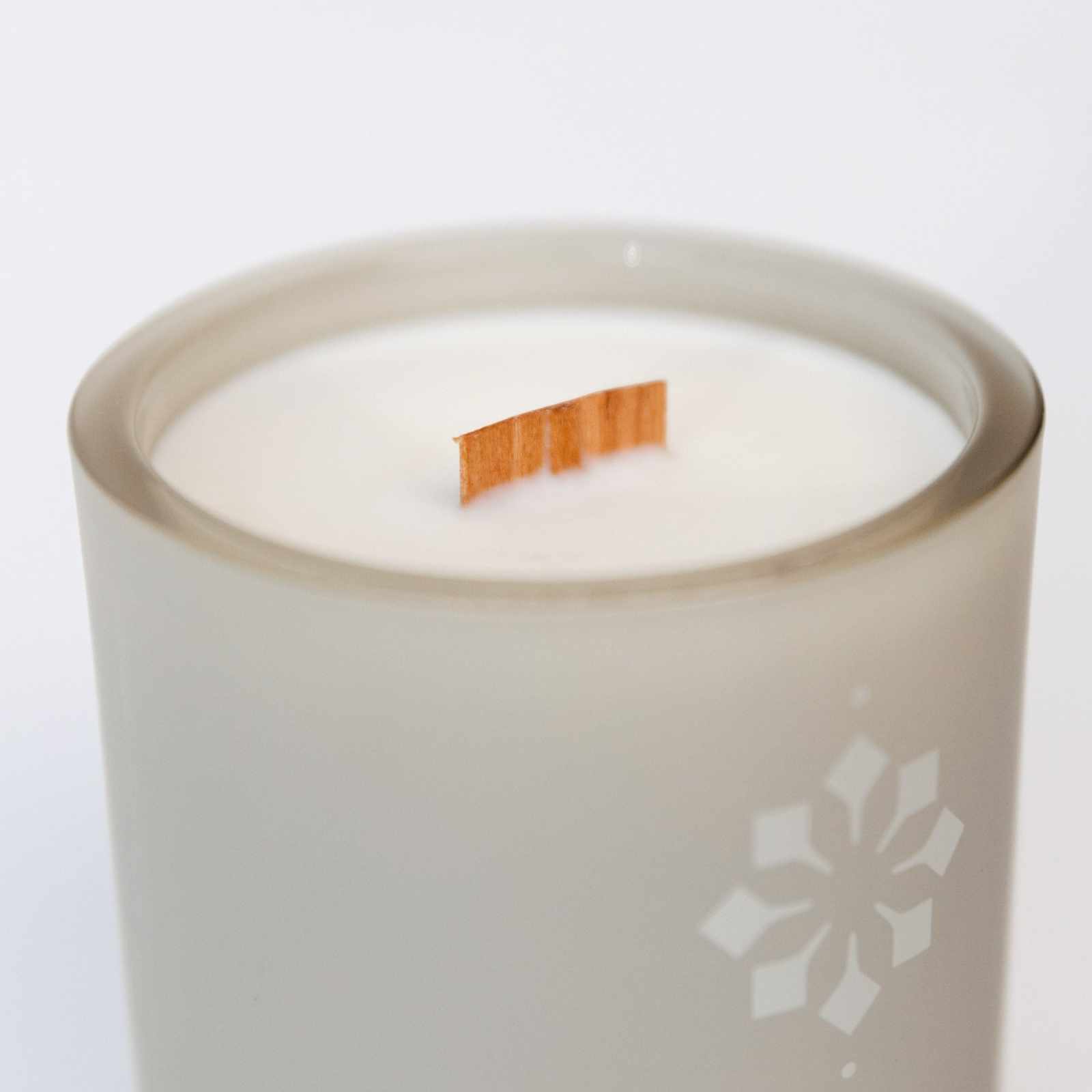 Lavender Candle in a frosted glass jar with a wooden wick.
