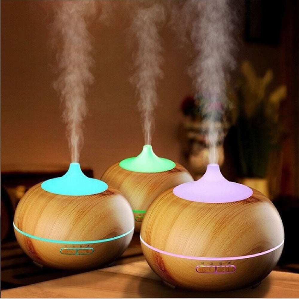 MISTysterious Humidifier Essential Oil in natural oak design with LED lights and mist output.