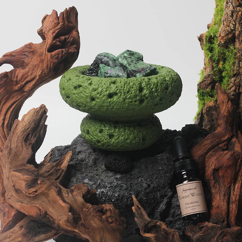 Green Moon Diffuser - Forest Woods scent amidst natural textures.