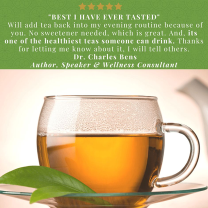 Clear glass cup filled with Avocado Leaf Tea Natural Leaf, next to a fresh avocado leaf.