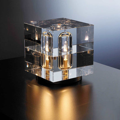 Lucent Crystal LED Table Lamp with rectangular crystal lampshade and brass base, offering three light modes for a versatile ambiance.