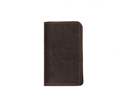 Handcrafted mini journal in full-grain leather with sewn edges.