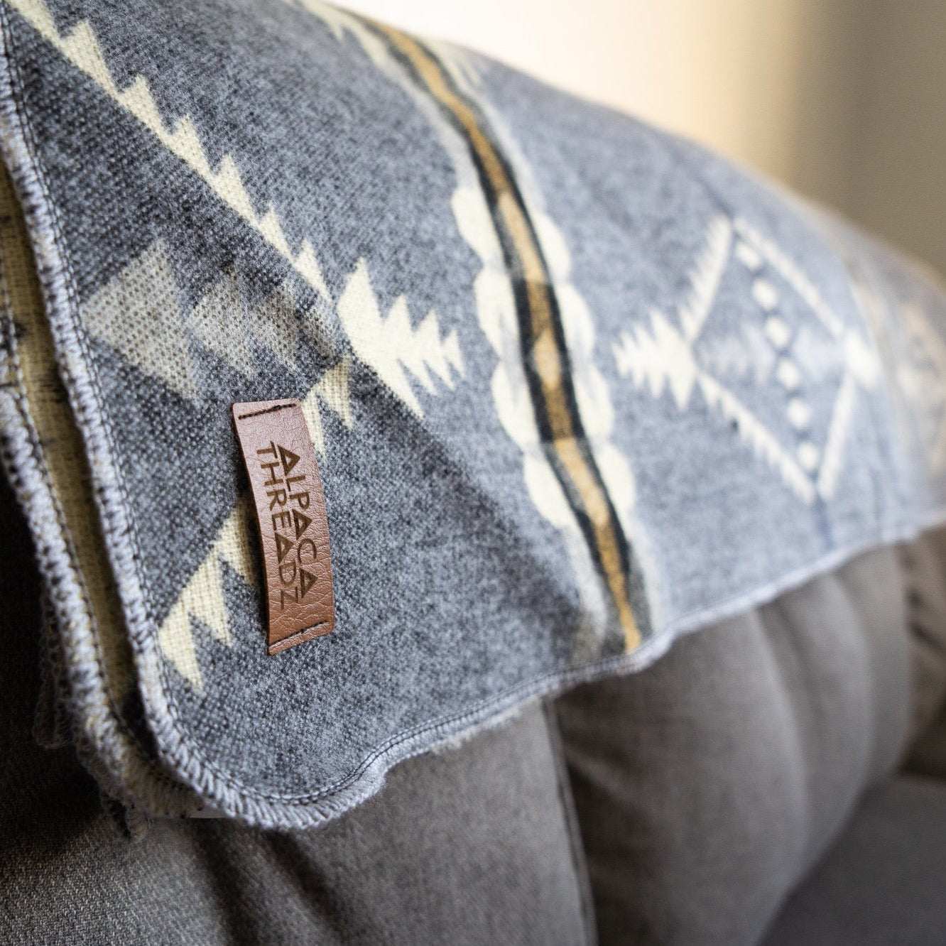 Andean Alpaca Wool Blanket – Cloud, reversible artisan-made, cashmere-soft, 50% alpaca wool blend, vibrant patterns.