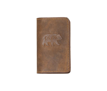 Handcrafted leather mini journal with bear design, featuring sewn edges and card slot.