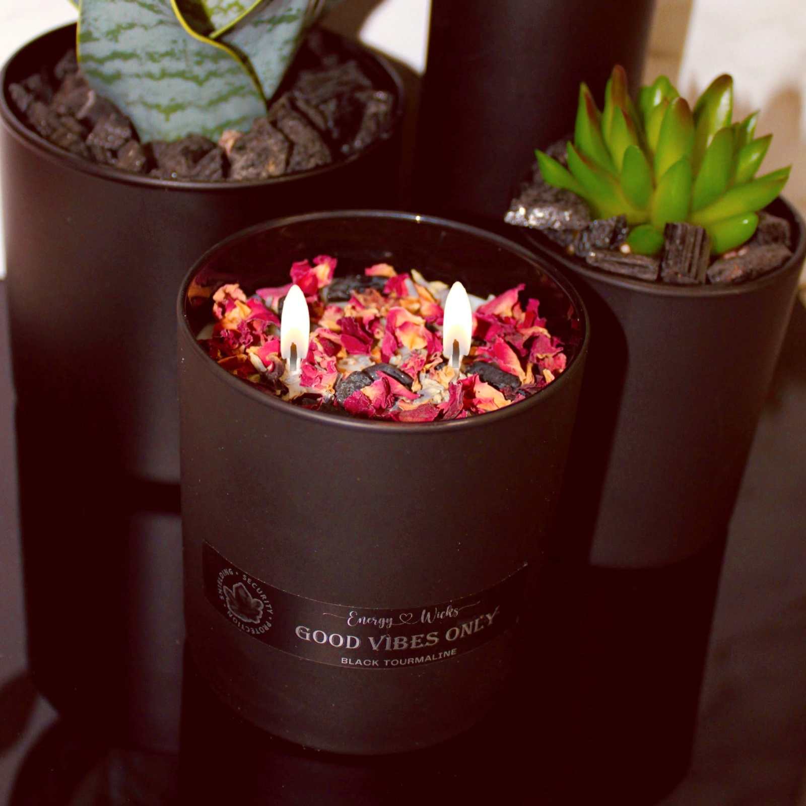 Good Vibes Candle with Black Tourmaline crystals and Citrus Agave fragrance in black holder.