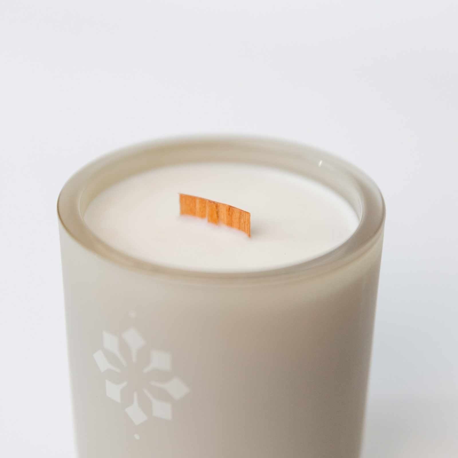 Canyon Sanctuary Candle with jasmine, rosewood, and violet fragrance in a glass container.