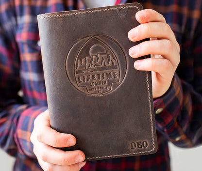 Handcrafted leather journal with personalized embossing, featuring durable American full-grain leather, card sleeve, and free lined kraft paper.