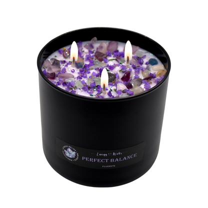 Perfect Balance Crystal Candle with Fluorite, black jar, three wicks, adorned with crystals.