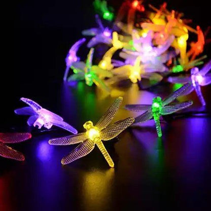 Dragonfly Solar LED String Light - illuminating in colorful patterns.