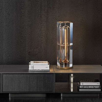 Crystal bedside table lamp with sleek rectangular crystal lampshade and brass base, offering elegant and modern design with three light modes.